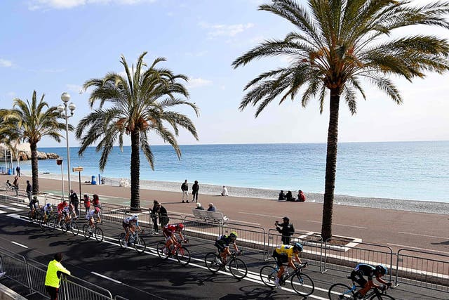 Geraint Thomas (yellow jersey) rides on the Promenade des Anglais during yesterday’s nail-biting final stage of the  Paris-Nice race which the Welshman won by just four seconds