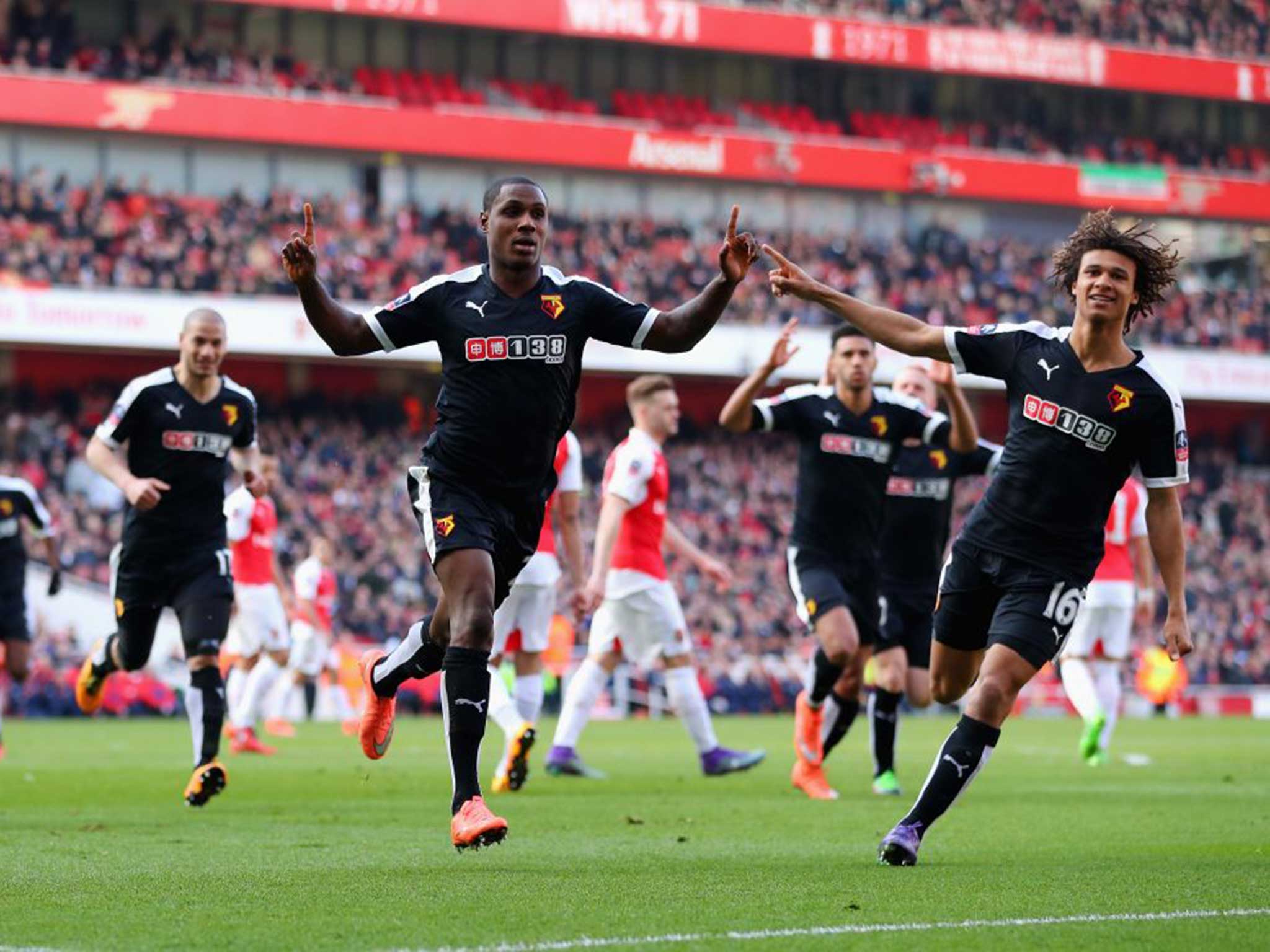 Watford’s Odion Ighalo (left) celebrates scoring the opening goal during the 2-1 FA Cup sixth round win over Arsenal at the Emirates Stadium getty