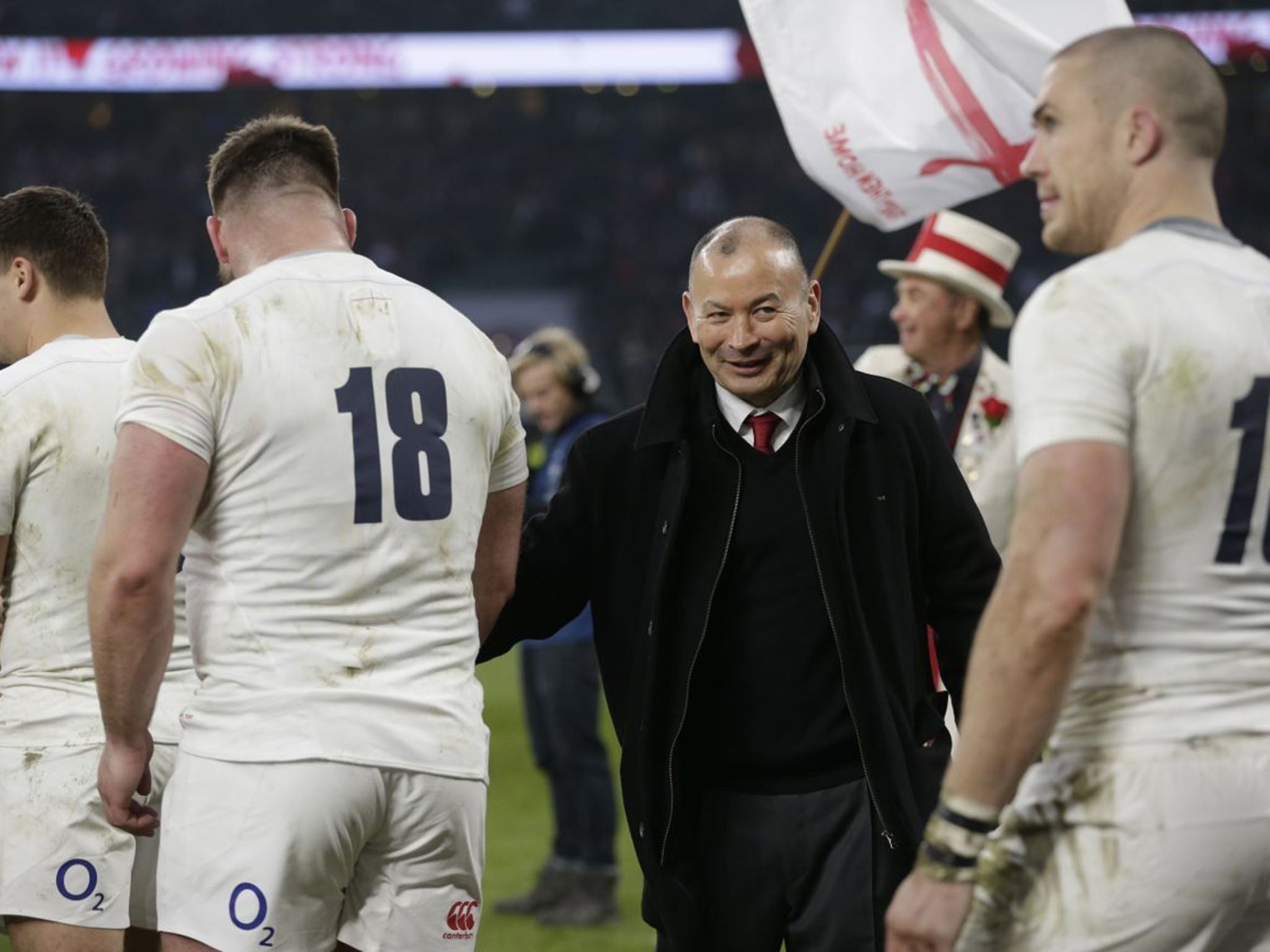 &#13;
Eddie Jones, the England coach, enjoys the moment after his side clinched the Triple Crown with victory over Wales (Getty)&#13;