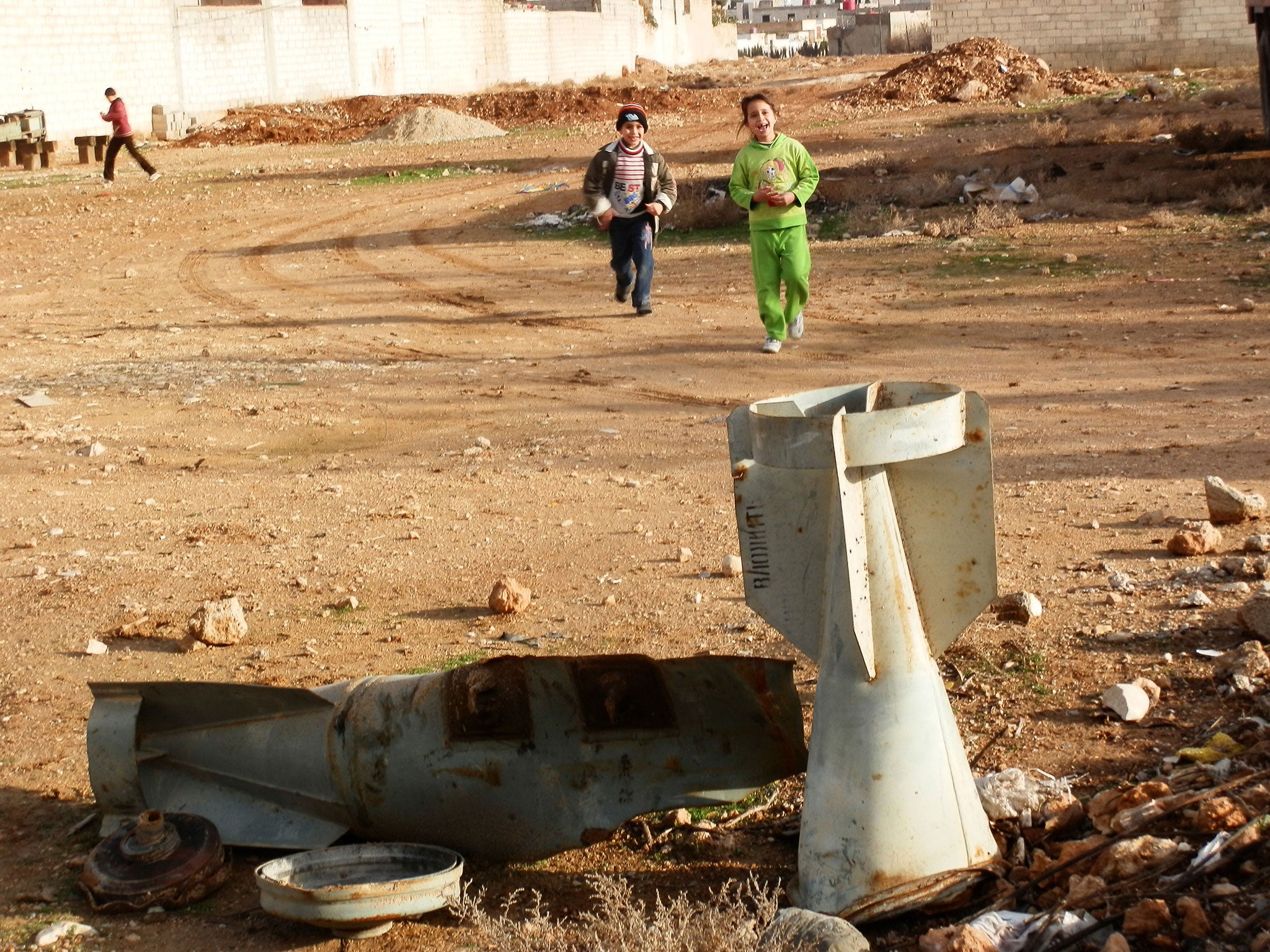 Children playing in Daraya, near Damascus