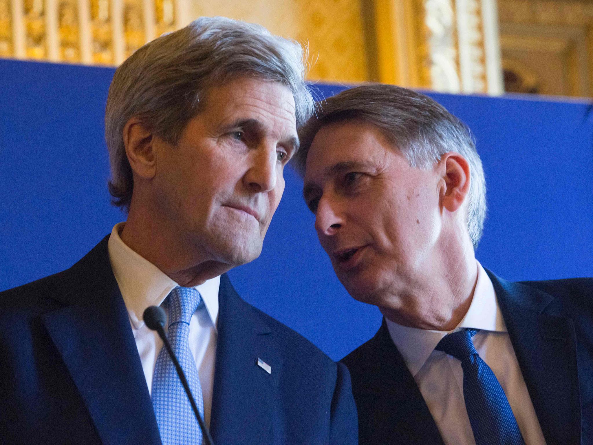 The US Secretary of State, John Kerry, left, and the British Foreign Secretary, Philip Hammond