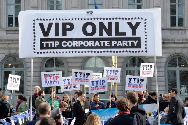Protesters demonstrate in Brussels against the TTIP