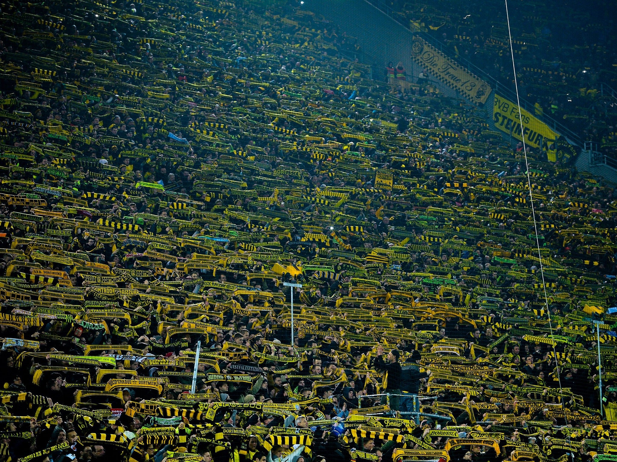 Dortmund supporters and players sing You'll Never Walk Alone