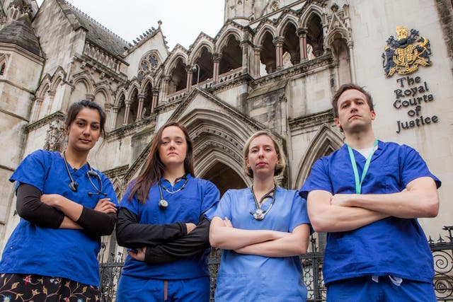 Junior doctors standing in front of the Old Bailey in London