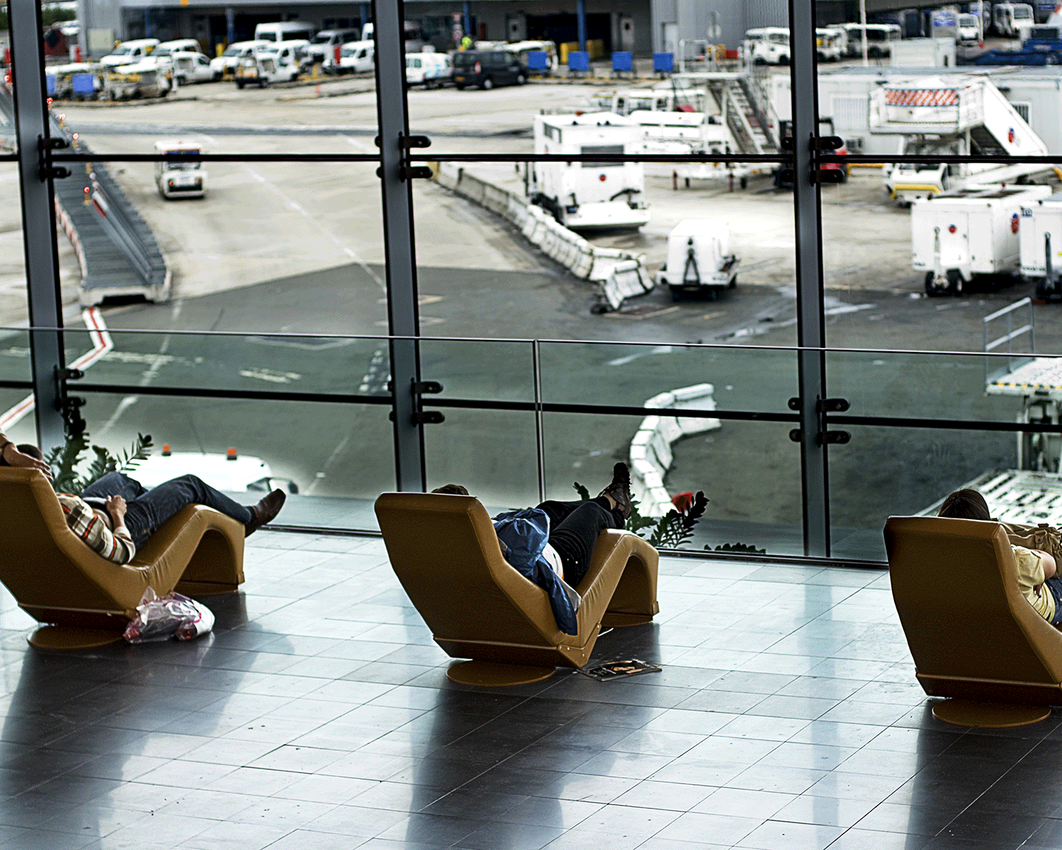 Passengers waiting for their flight at Charles de Gaulle airport in Paris