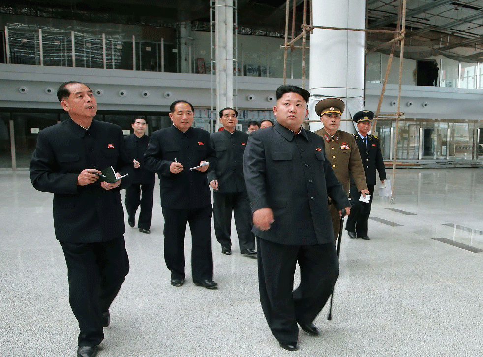 North Korea's leader Kim Jong-un inspects the new airport in 2014