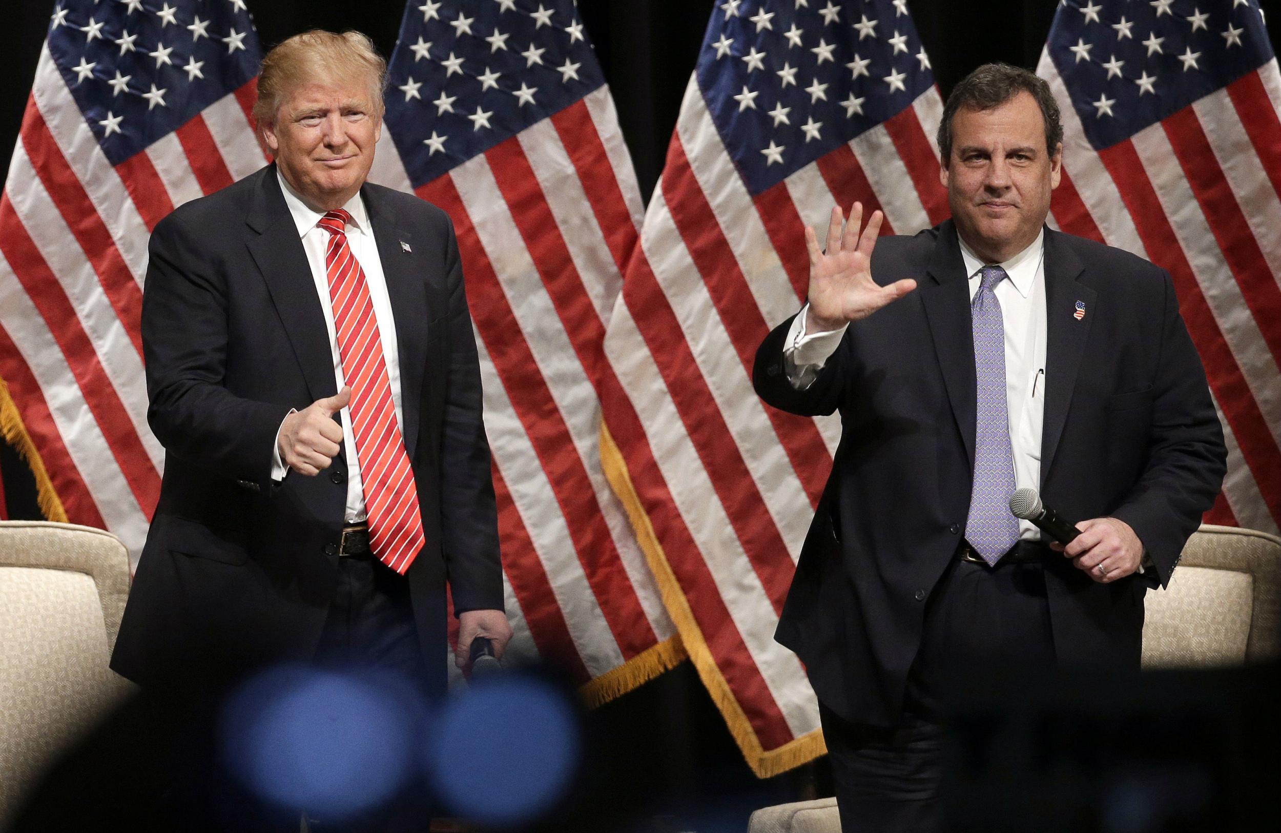 Mr Trump and Mr Christie laughed as protestors were escorted out the hall