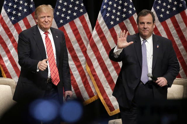 Mr Trump and Mr Christie laughed as protestors were escorted out the hall
