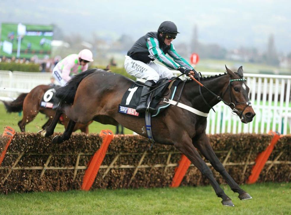 Altior passes Min on his way to victory in the Supreme Novices' Hurdle