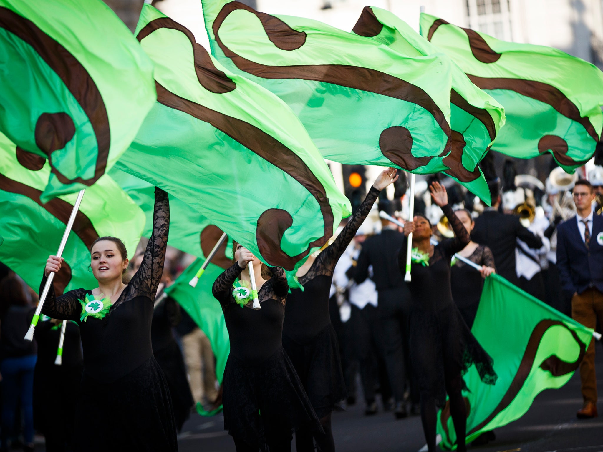 Members of the Coppell High School Marching Band take part in the St Patrick's Day parade through central London