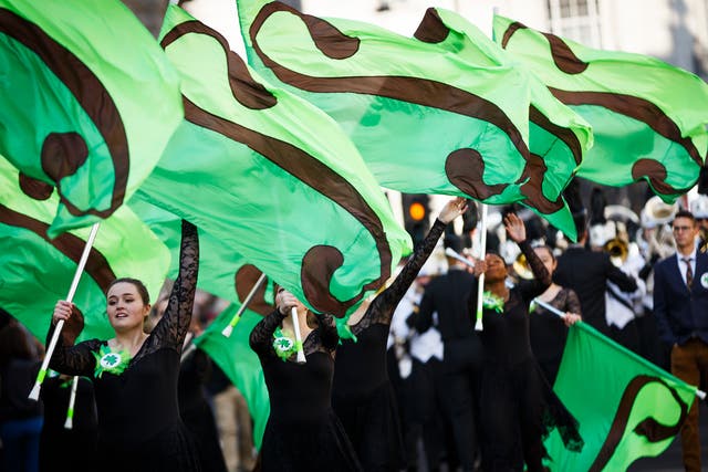Members of the Coppell High School Marching Band take part in the St Patrick's Day parade through central London
