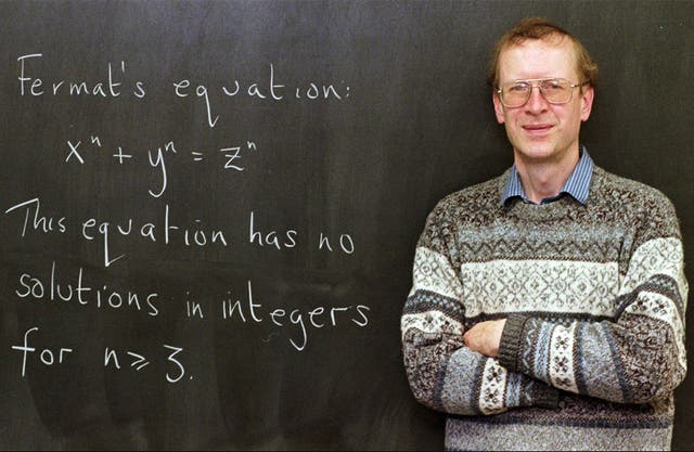 Sir Andrew John Wiles poses next to "Fermat's Last Theorem" in 1998
