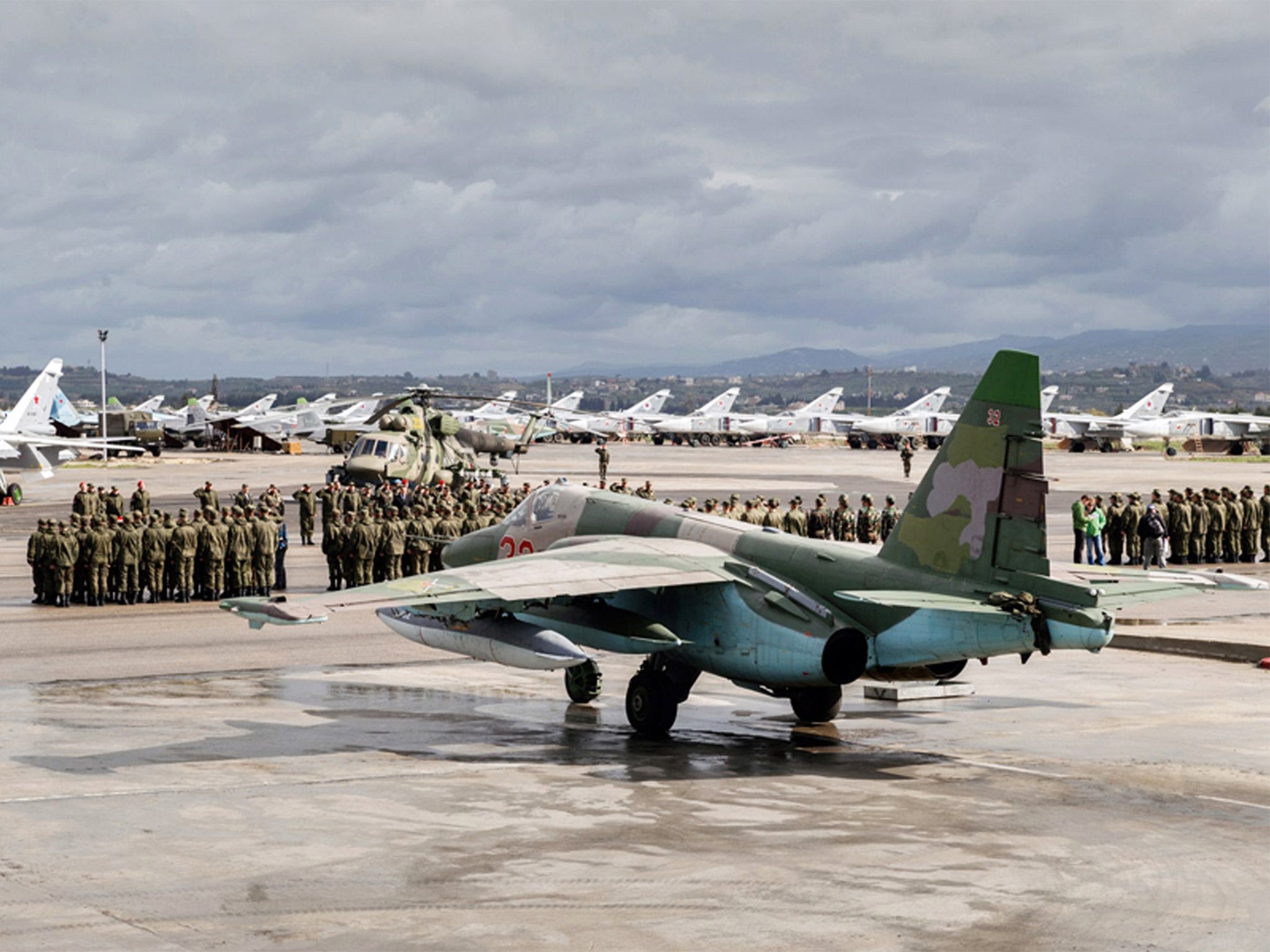 Russian troops at Hemeimeem air base in Syria on Tuesday