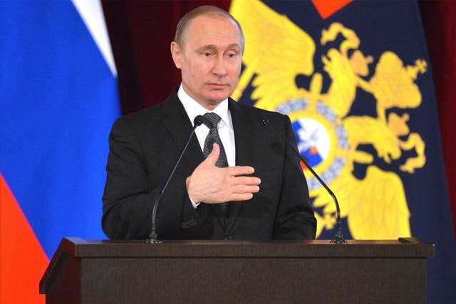 Russia President Vladimir Putin delivers an address in Moscow on Tuesday