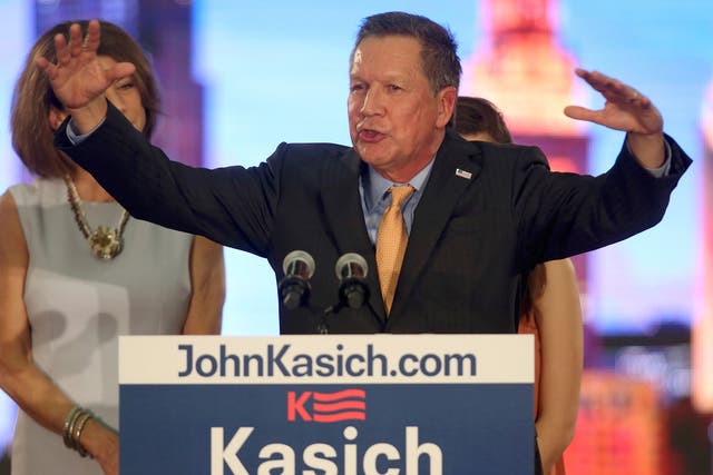 Republican presidential candidate John Kasich speaks to supporters after being declared the winner of the Ohio primary