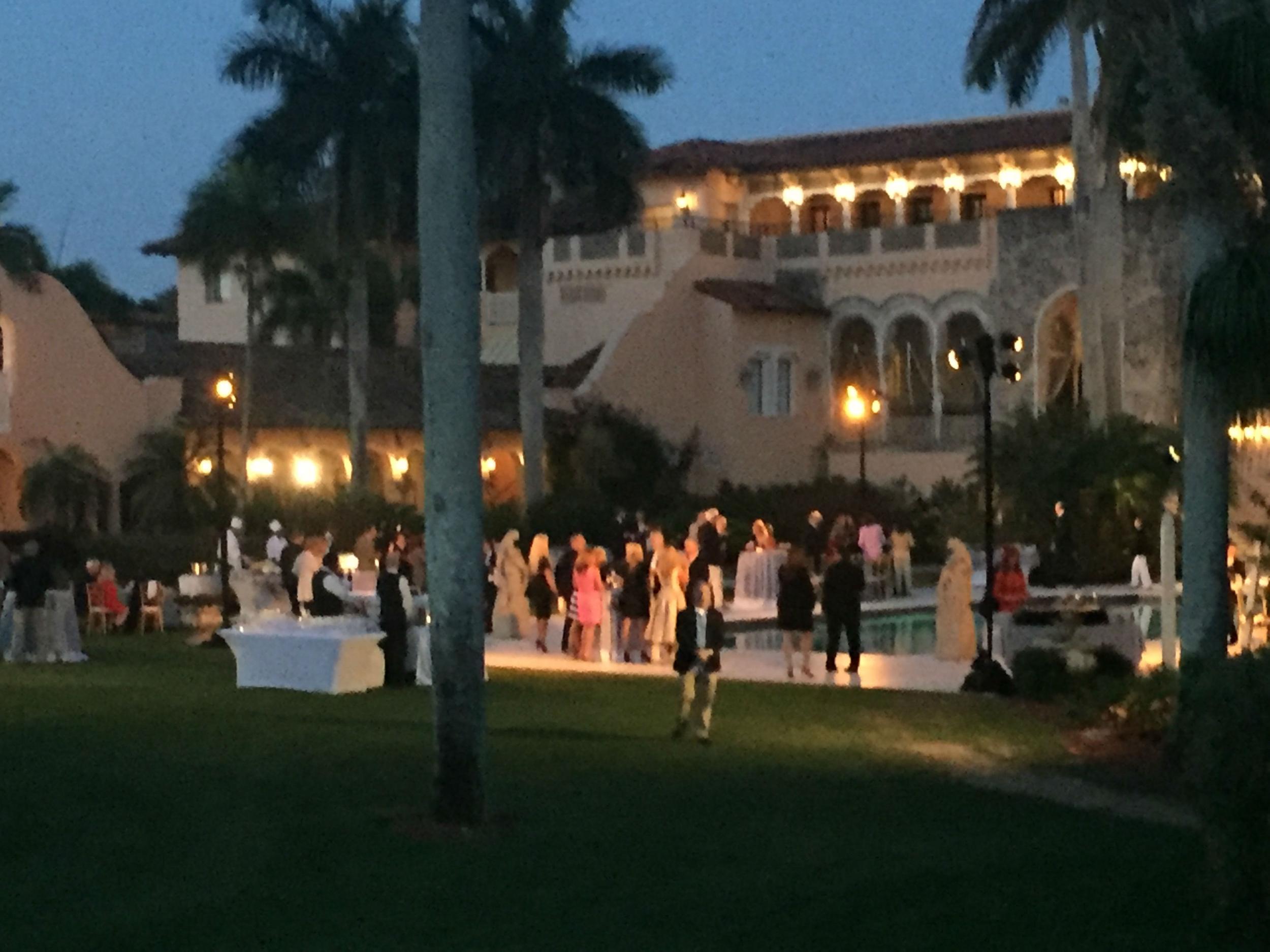Gushing guests gather by the pool