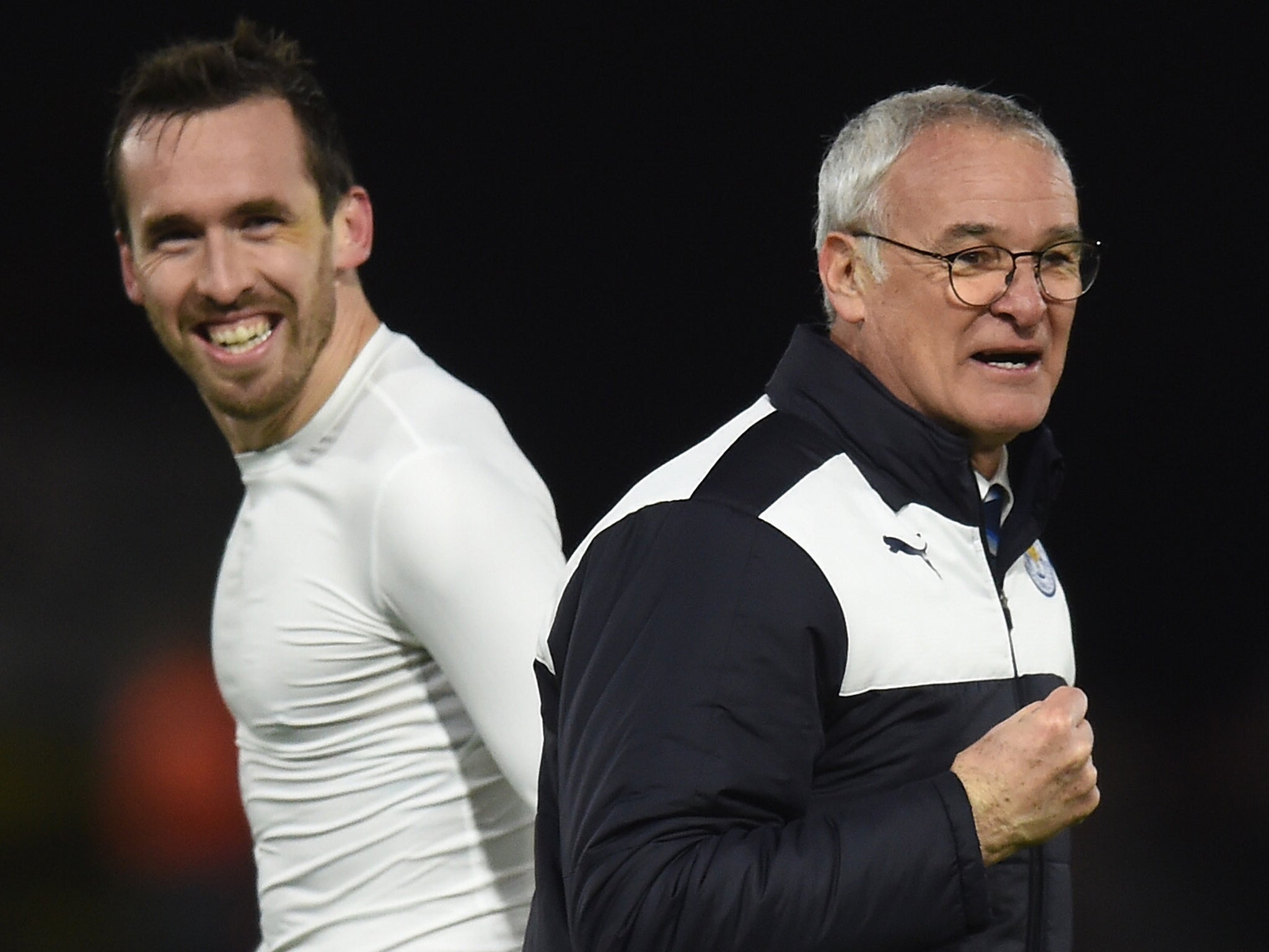 Claudio Ranieri celebrates a win with Leicester City's Christian Fuchs
