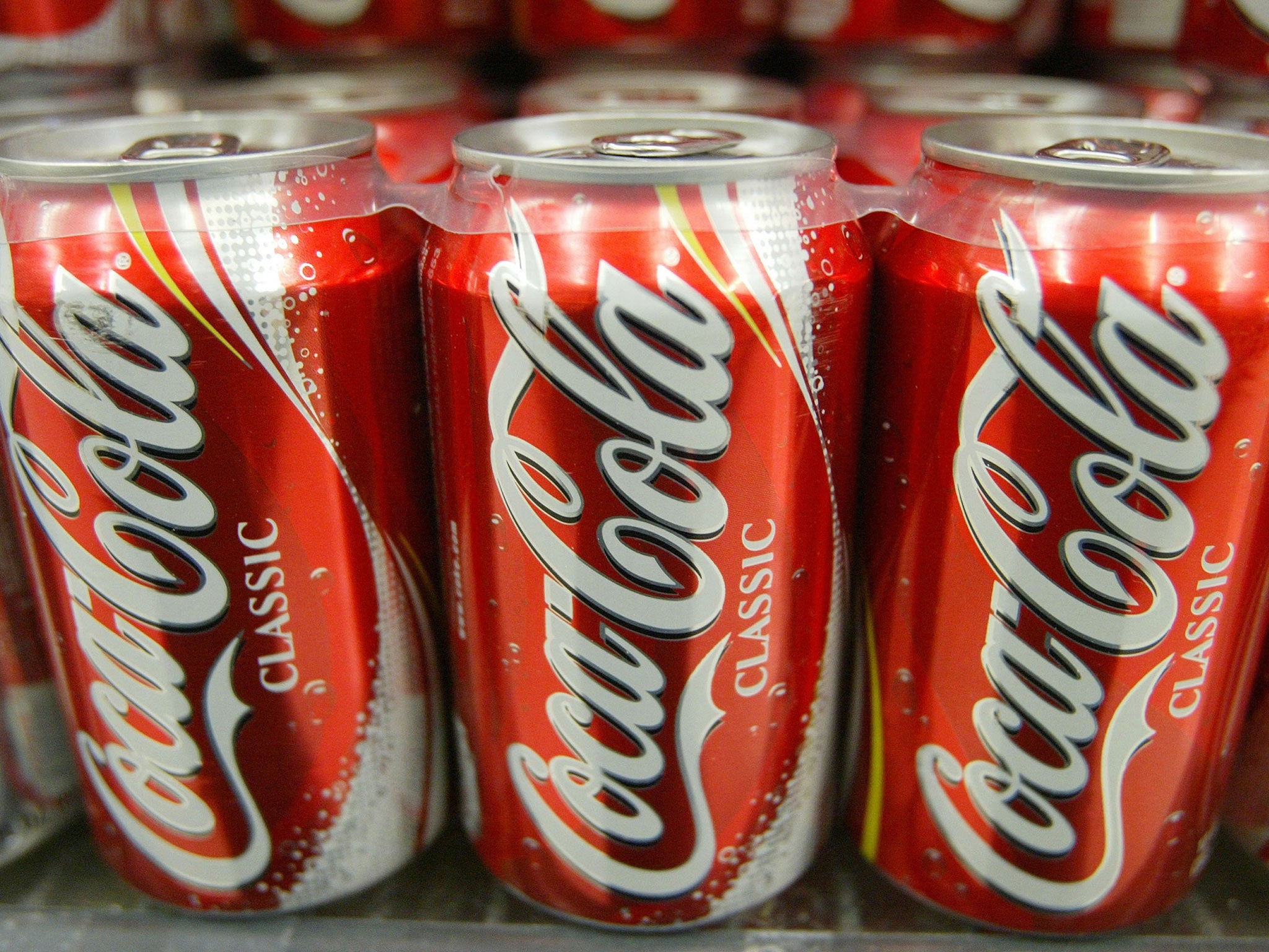 Cans of Coca-Cola contains 35g of sugar per can, or seven teaspoons