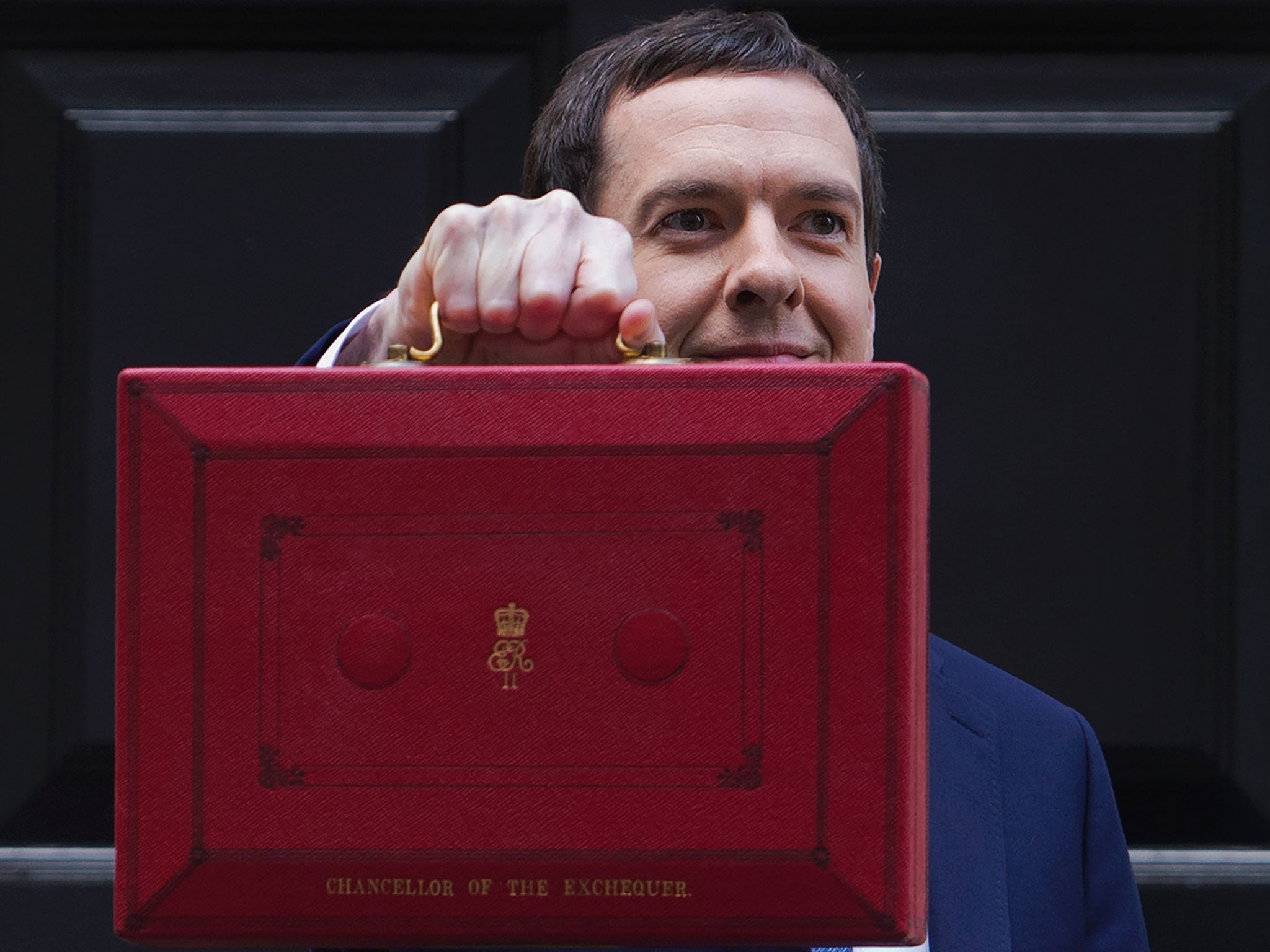 British Finance Minister George Osborne poses for pictures with the Budget Box as he leaves 11 Downing Street