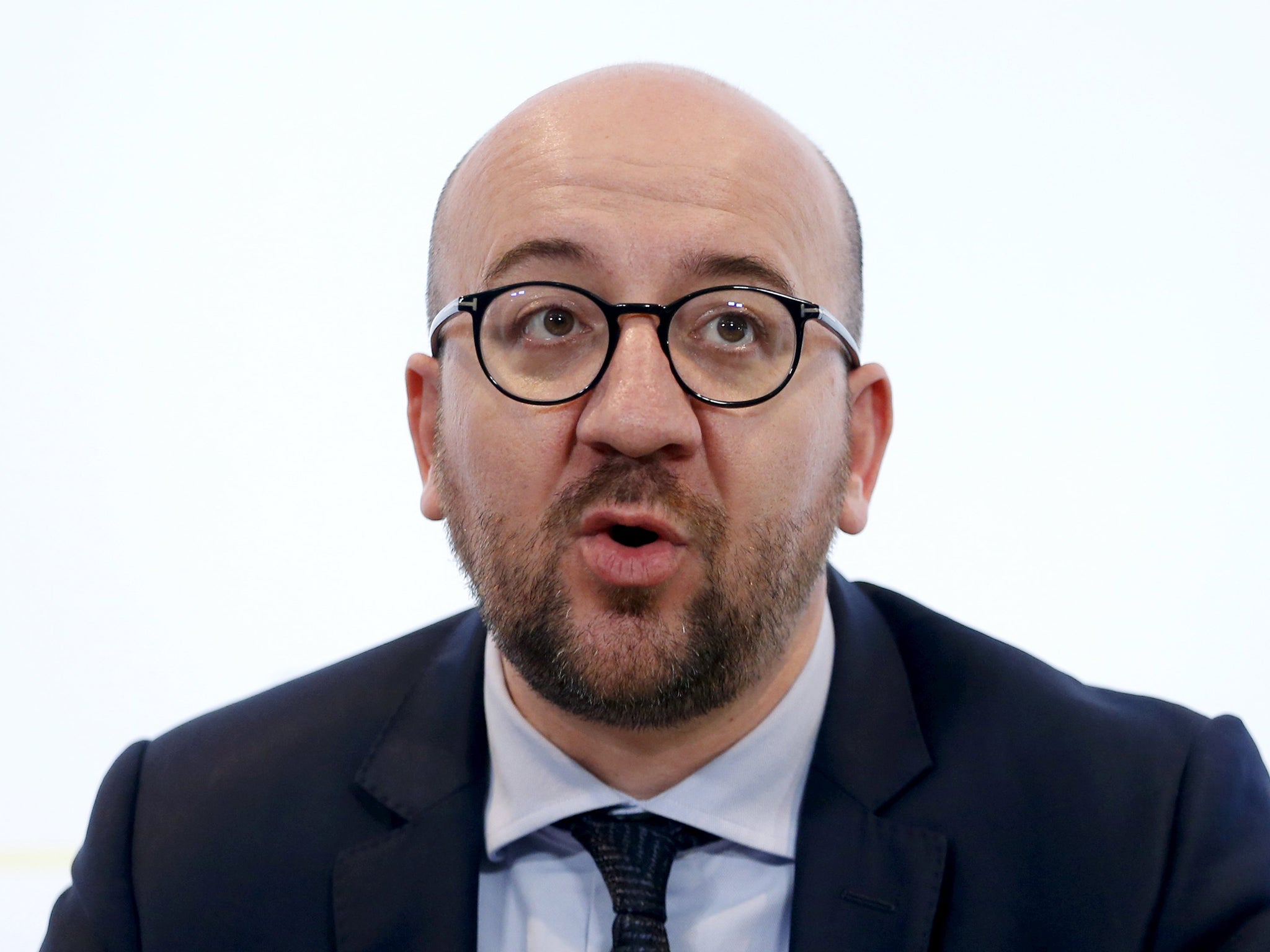 Belgian Prime Minister Charles Michel addresses a news conference in Brussels after a shootout