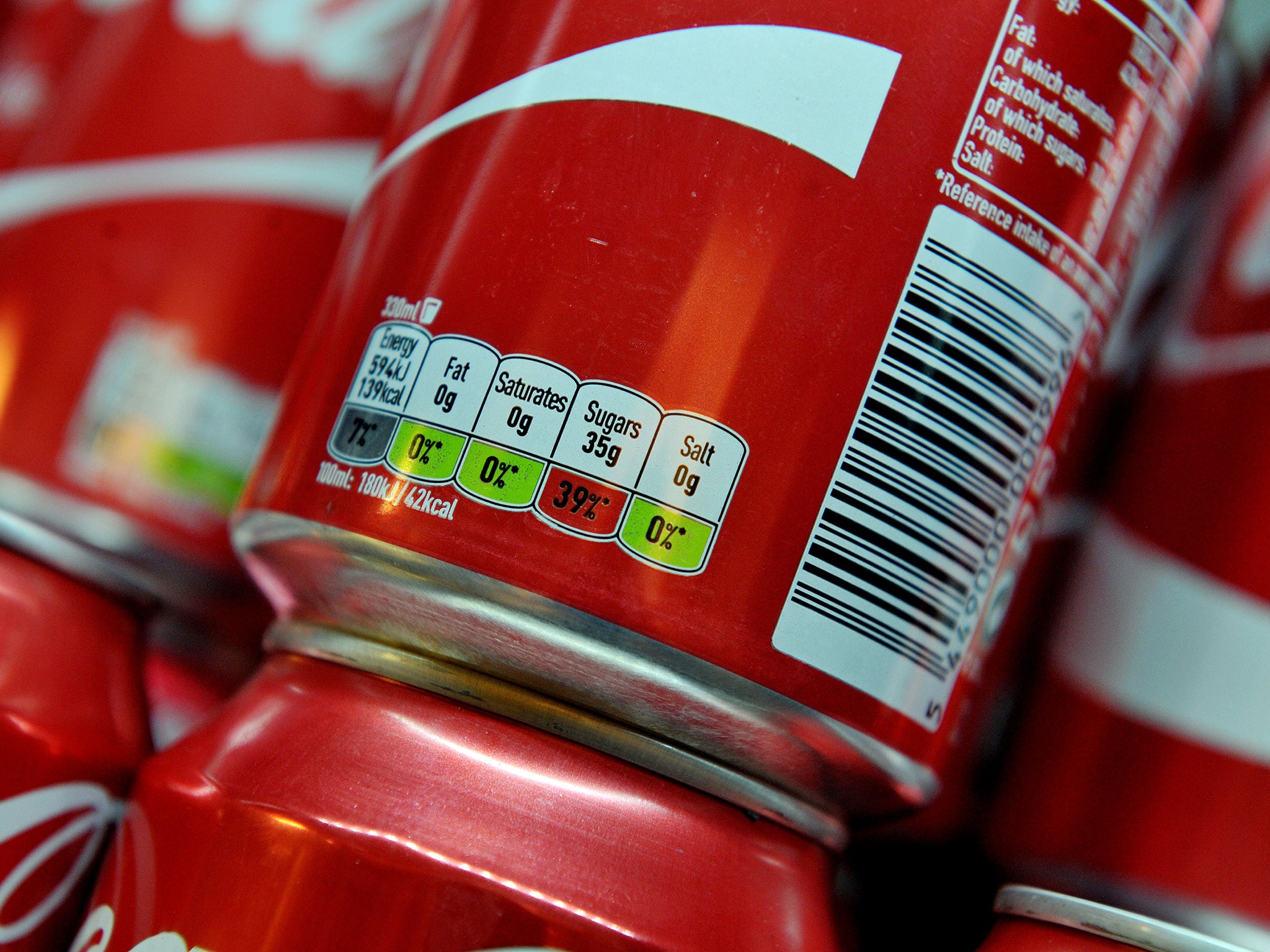 Cans of Coca-Cola which would currently fall within the higher rate of the sugar tax