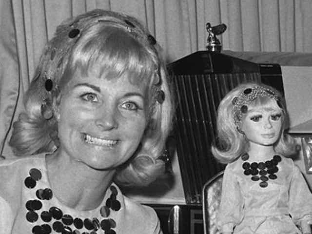 Anderson with Lady Penelope, who she voiced with an air of class and sex appeal