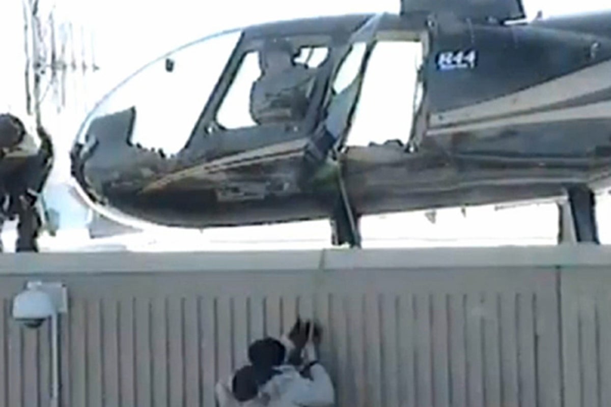 Video shows two inmates escaping from prison roof via helicopter in ...