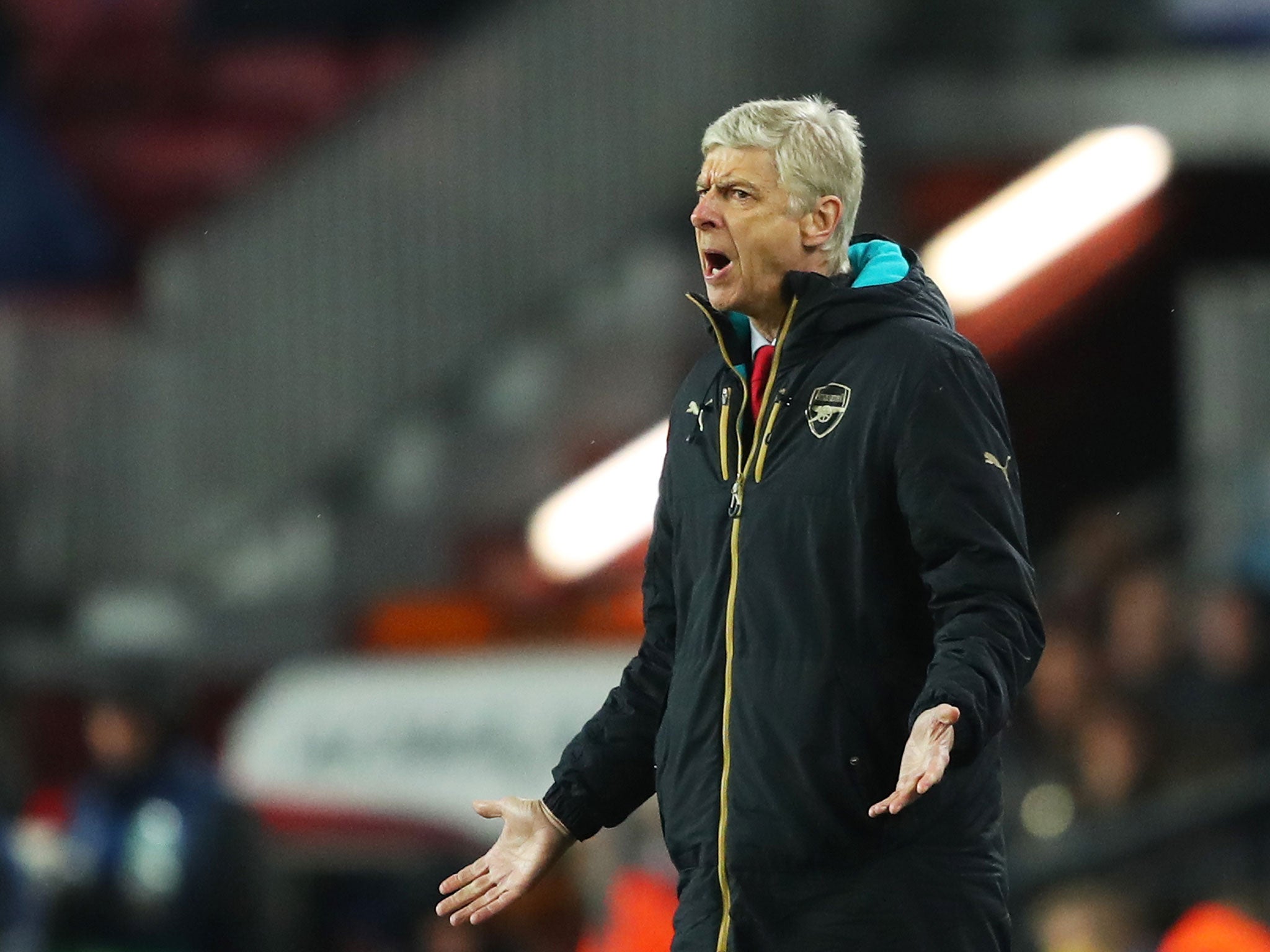 Arsenal manager Arsene Wenger gestures during the 3-1 defeat by Barcelona