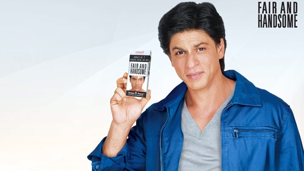 Bollywood star Shah Rukh Khan promoting beauty company Fair and Handsome's skin lightening product