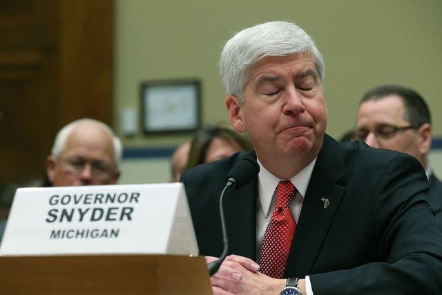 Congress members have called for Michigan Governor Rick Snyder to resign over the Flint water crisis.