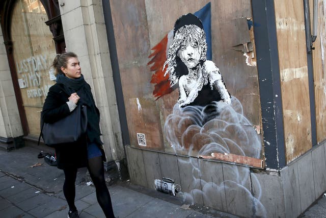 Revolutionary figure: a graffiti mural by Banksy