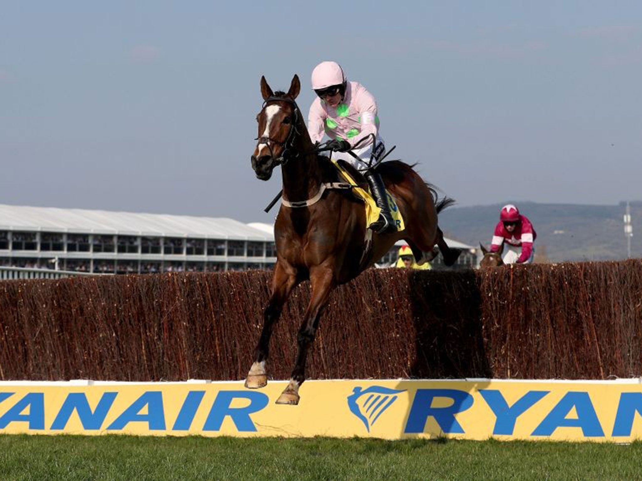 Ruby Walsh on Vautour leaps over the final fence on his way to victory in the Ryanair Chase