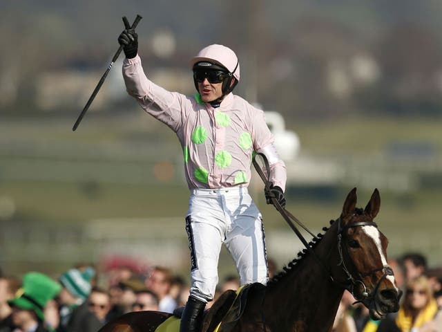 Ruby Walsh celebrates after riding Vautour to victory in the Ryanair Chase