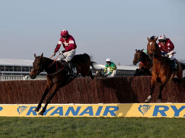 Empire Of Dirt jumps over the last fence on his way to victory in the 4.10 at Cheltenham