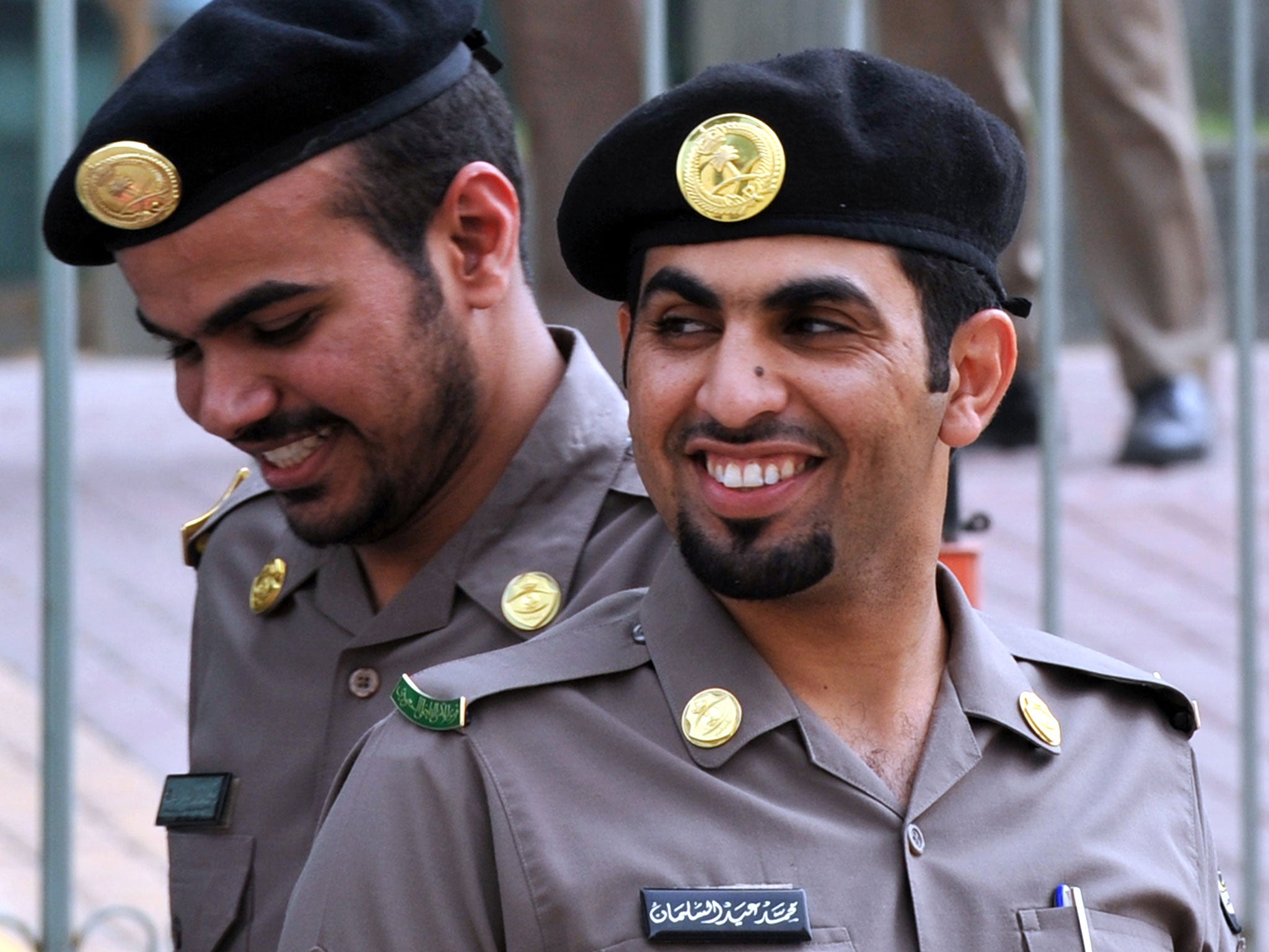 Saudi police officers guard the Public Grievances Department in Riyadh