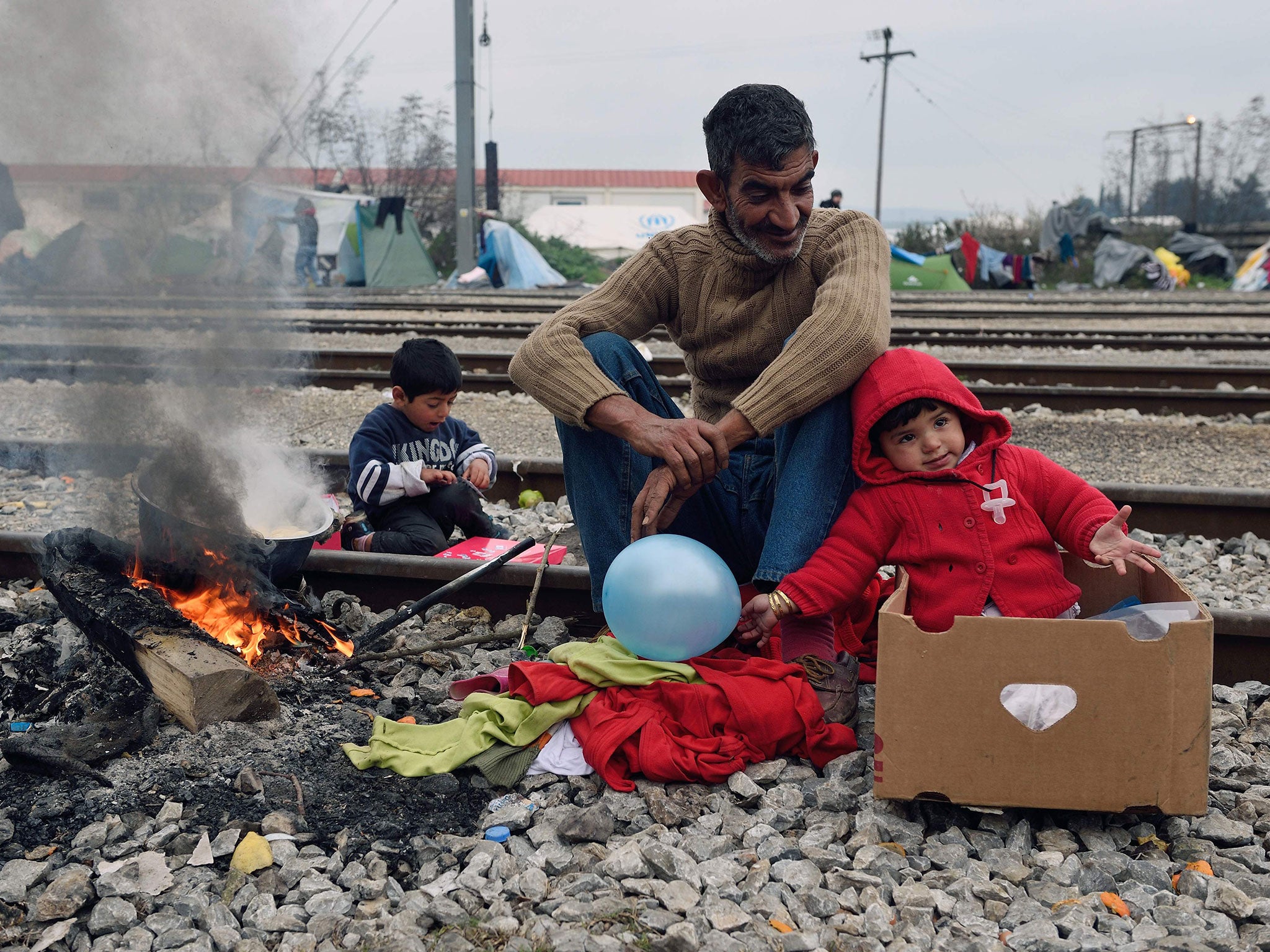 Refugees at a makeshift camp near the Greek village of Idomeni; thousands are stranded at the Balkan border