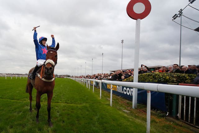 Paddy Brennan salutes the crowd at Kempton after Cue Card’s victory in the King George VI Chase