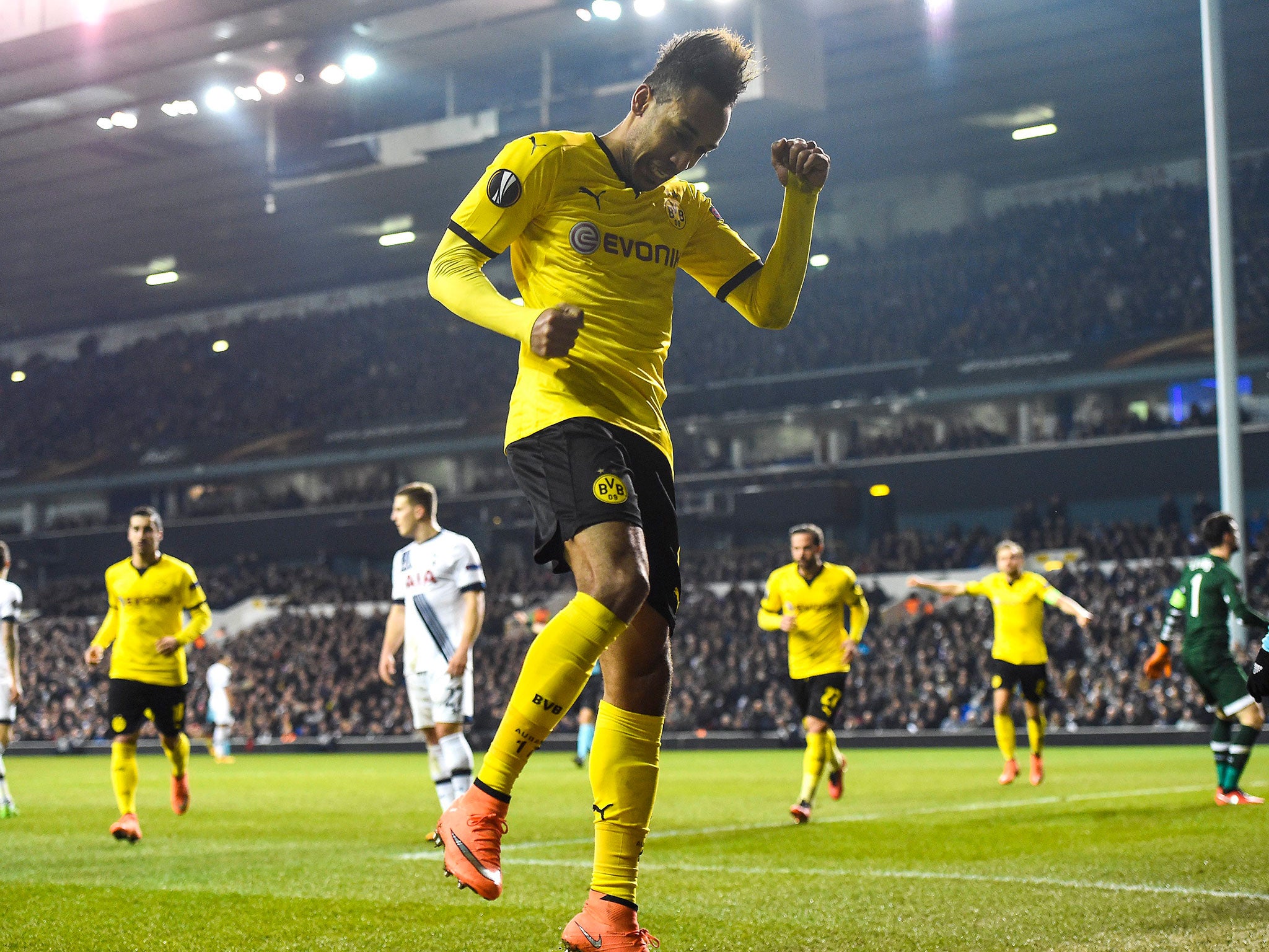 Dortmund's Pierre-Emerick Aubameyang, center, celebrates after scoring the 2-0 lead during the match between Tottenham Hotspur vs Borussia Dortmund