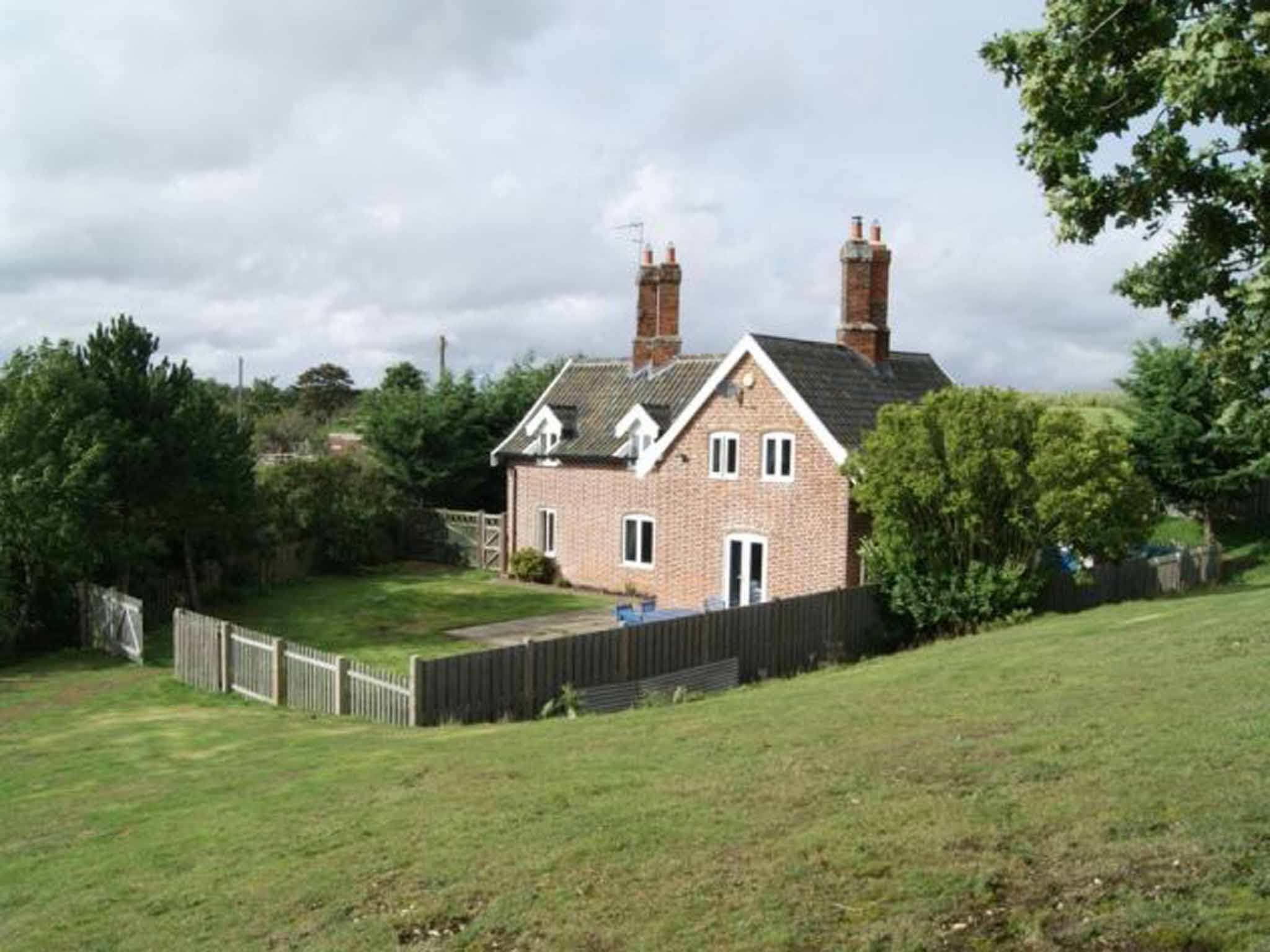 Quay Lane Cottage in Reydon, near Southwold, has three bedrooms, four acres and lovely rural views – plus a detached studio building. On with Flick & Son for £625,000
