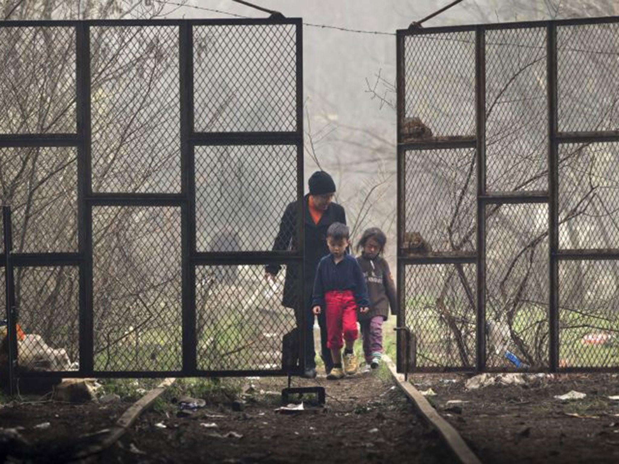 A mother and two children at Idomeni