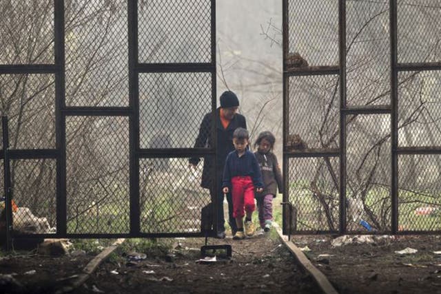 A mother and two children at Idomeni