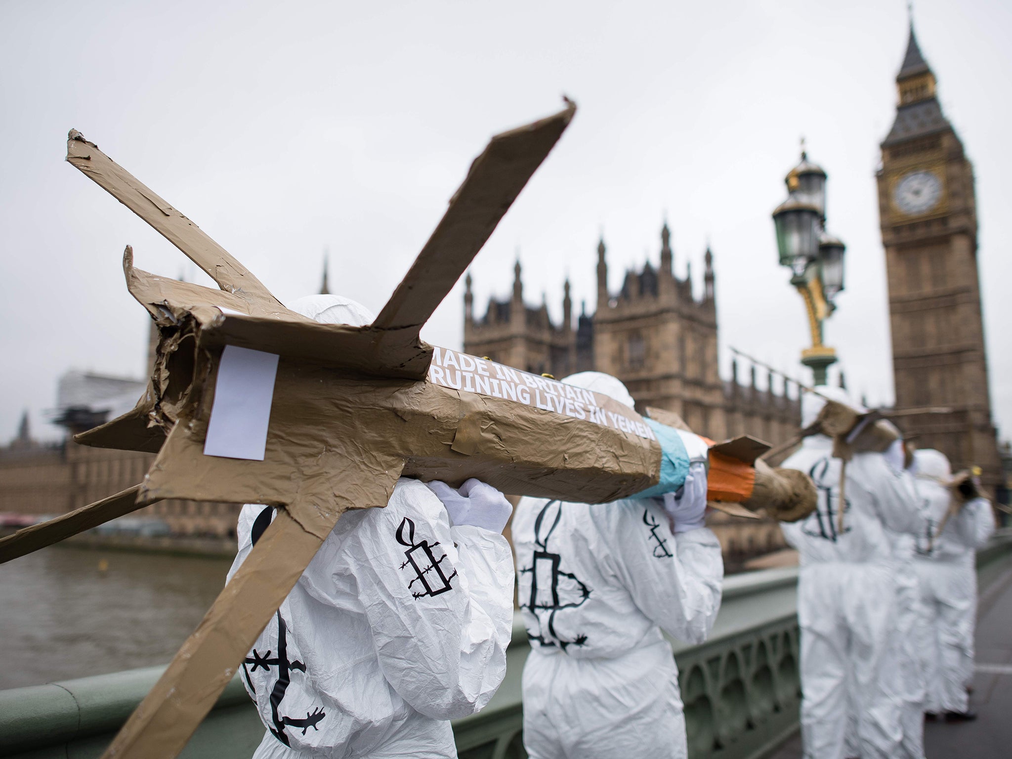&#13;
Campaigners from Amnesty International carry model missiles across Westminster Bridge in a protest against British arms sales to Saudi Arabia&#13;