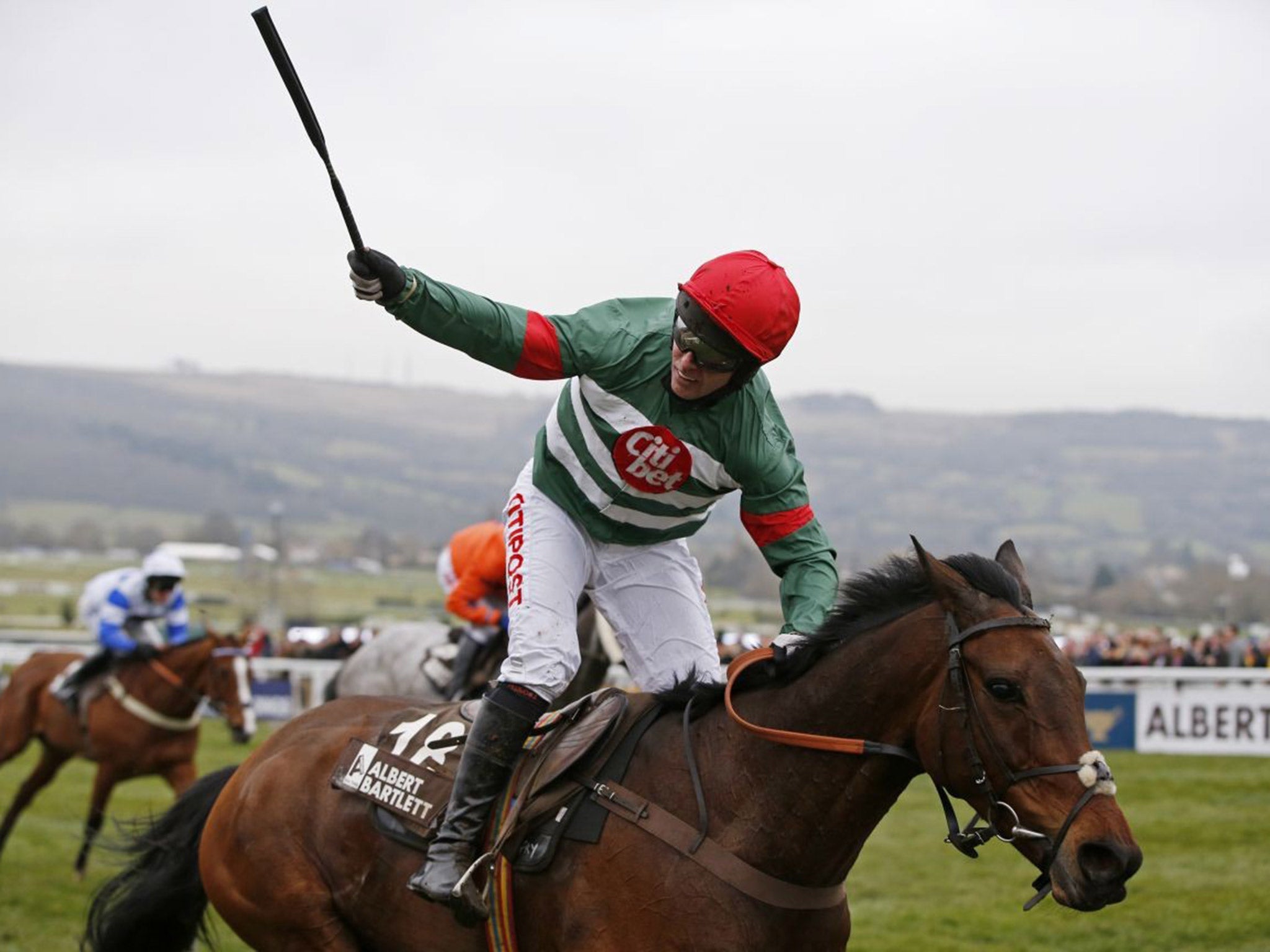 Noel Fehily celebrates on Unowhatimeanharry after riding to victory in the Novices' Hurdle