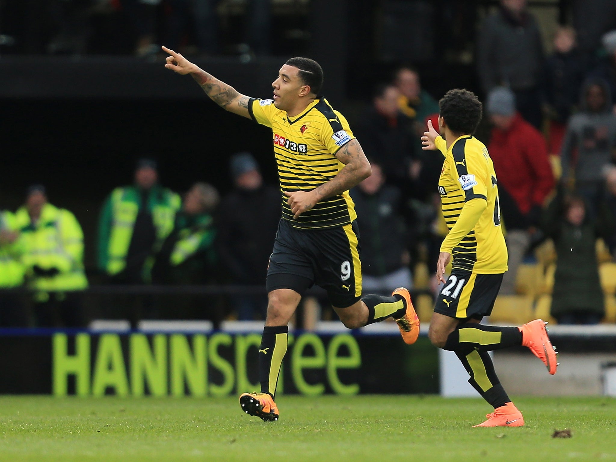 Troy Deeney celebrates his late goal which brought Watford back into the game