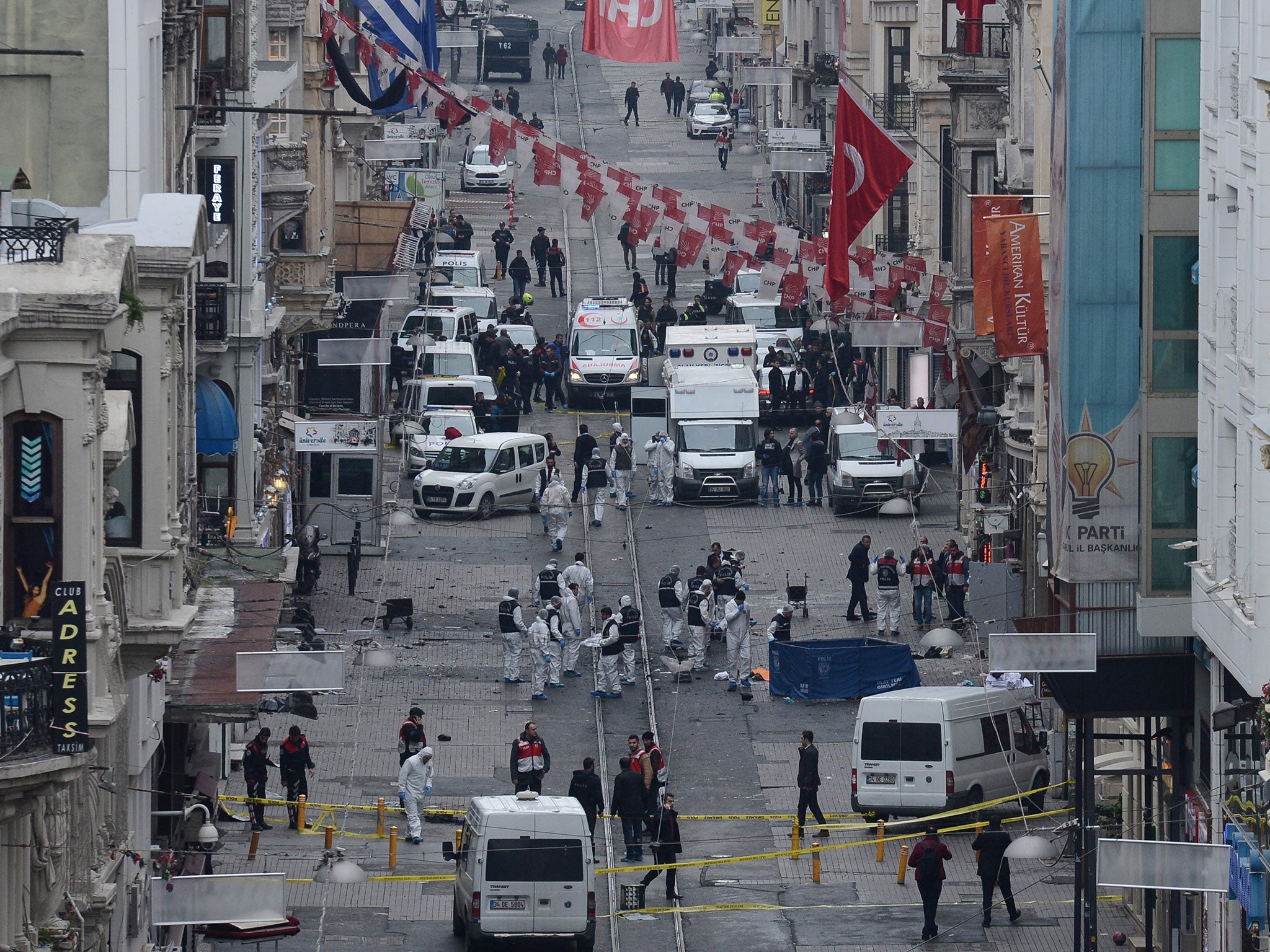 Police inspect the site after an explosion in Istiklal Street in Istanbul, Turkey, 19 March 2016.