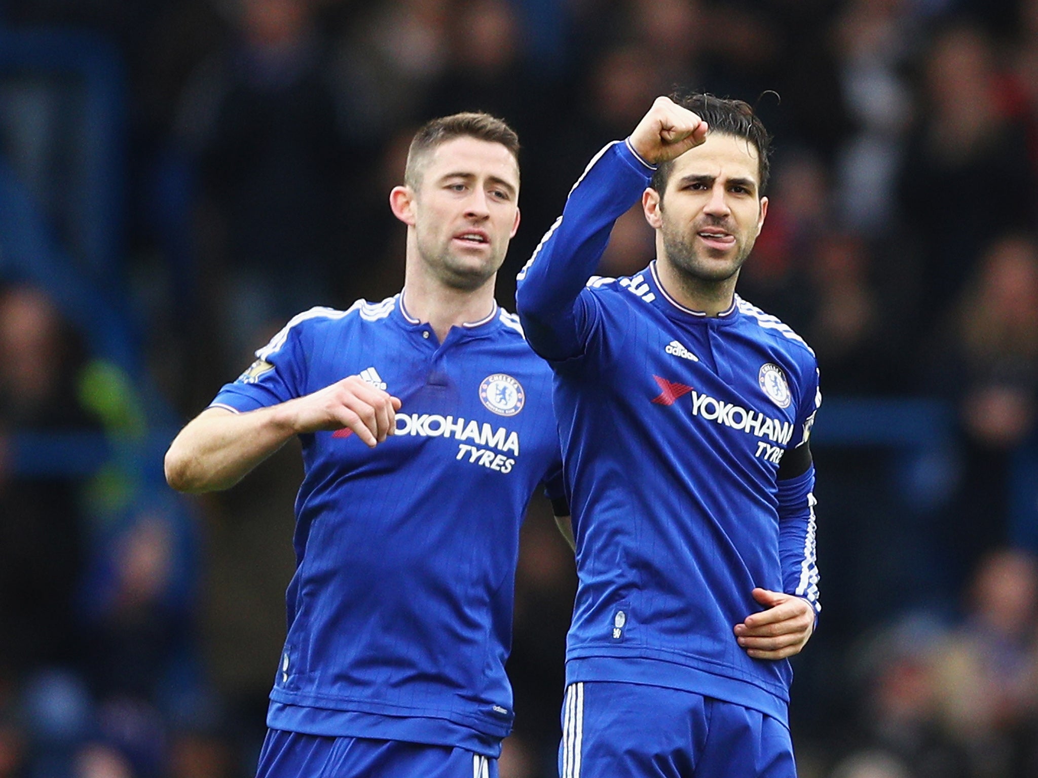 Cesc Fabregas celebrates scoring his first goal of the day