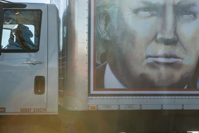 Driver Kraig Moss, on his CB radio, advertises a ‘Truckers for Trump’ convoy in Iowa