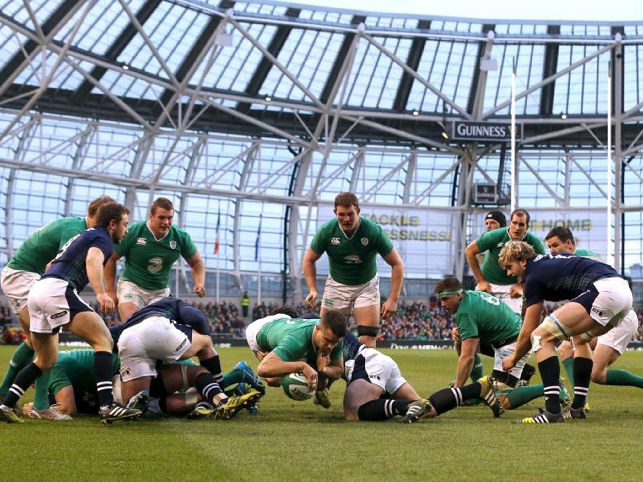 Conor Murray darts over to score a try for Ireland