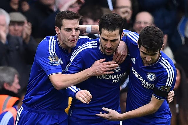 Cesar Azpilciueta, Cesc Fabregas and Oscar celebrate Chelsea's first goal