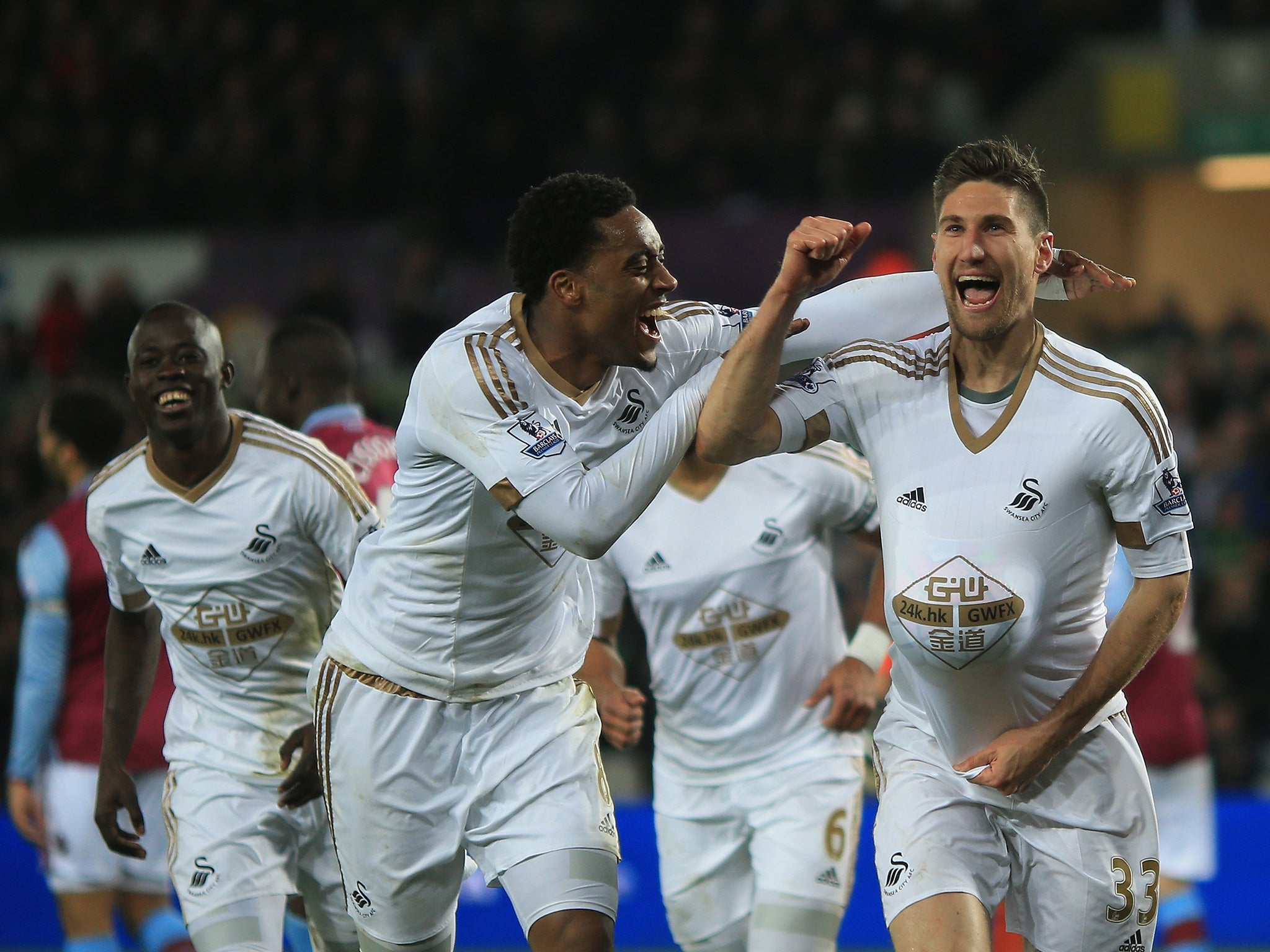 Swansea City defender Federico Fernandez celebrates his goal